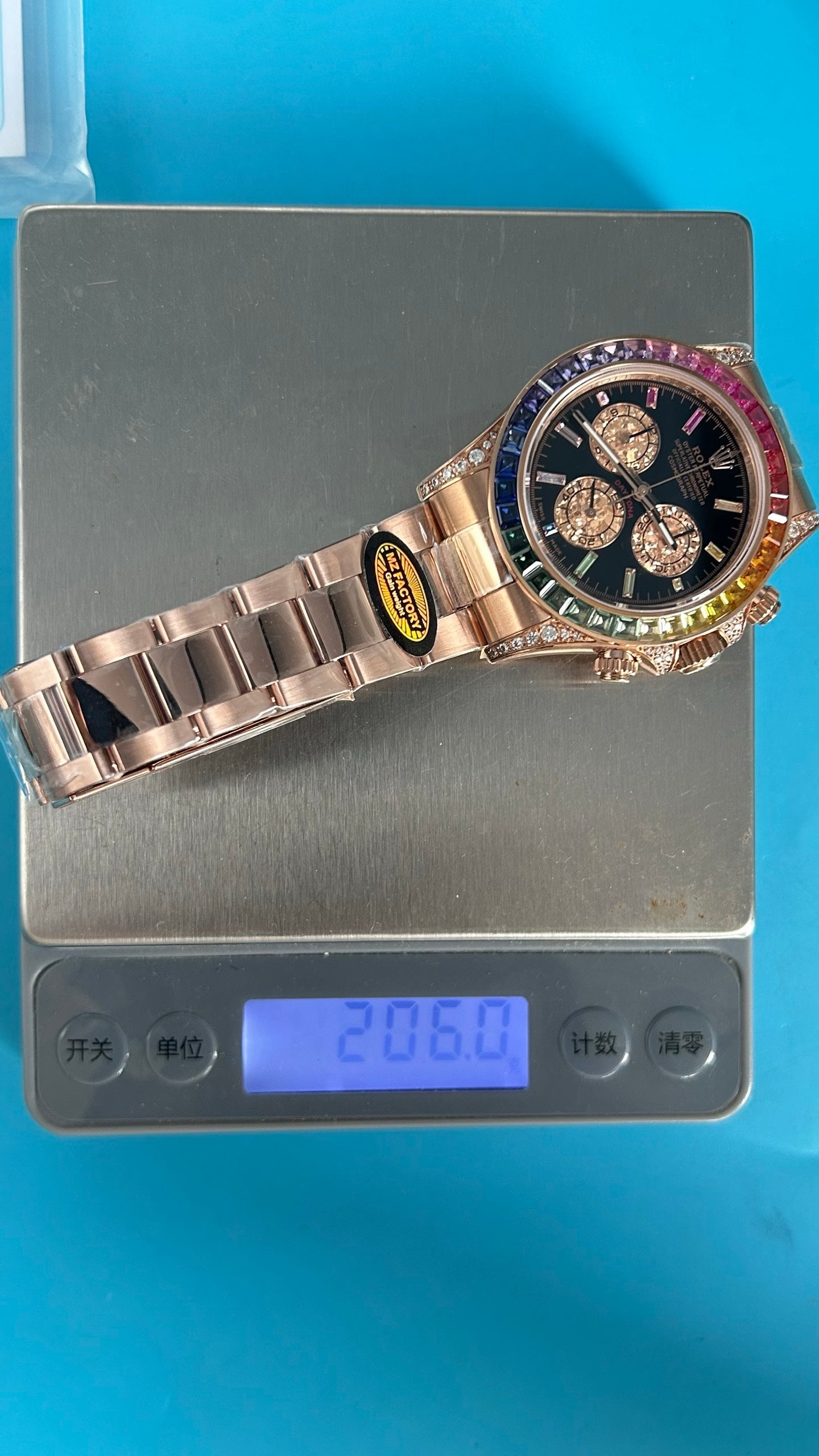 Rolex Daytona « Rainbow » MZ SUPER CLONE Or Rose Cadran Noir Lunette Saphir